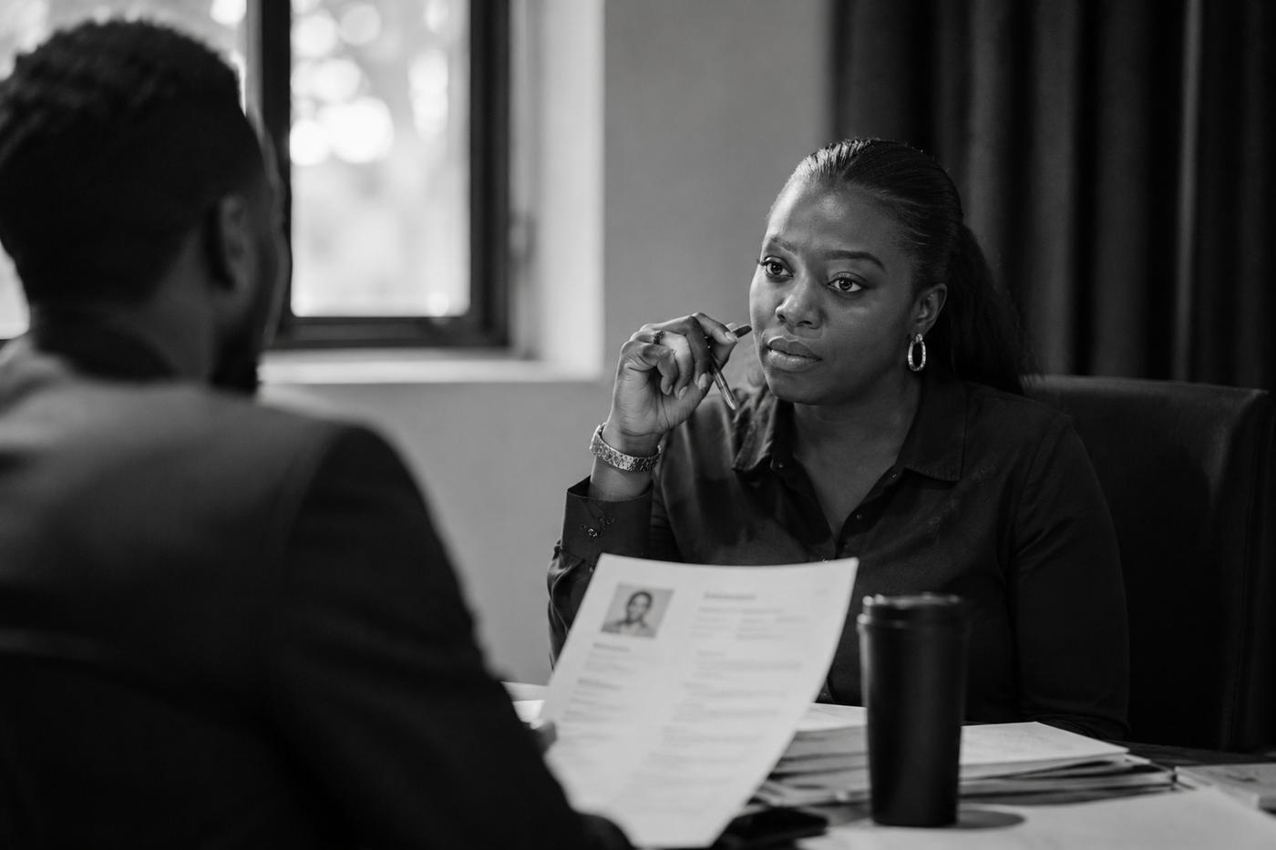 HR leader reviewing a candidate against role criteria